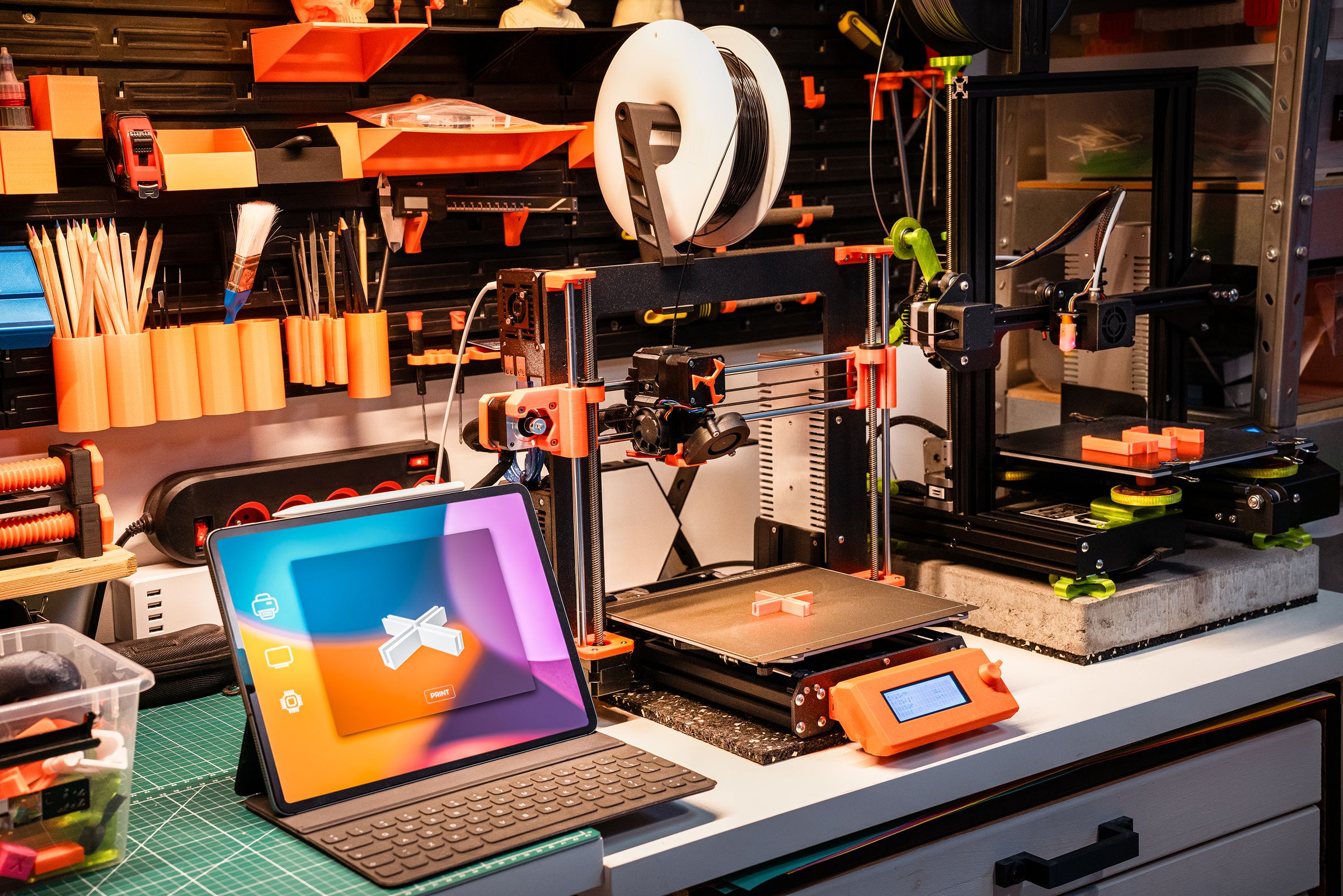 Industrial 3D printer producing a part